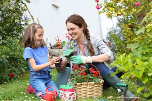 Front view of a gardener inspecting a backyard prior to complaint review